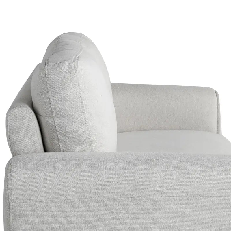 Canapé deux places moelleux en microfibre avec accoudoirs arrondis et assise rembourrée