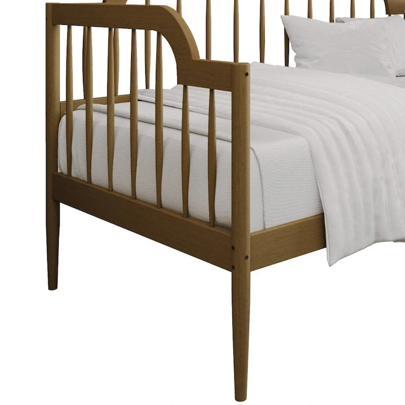 Classic Wooden Spindle Daybed with Curved Back and Warm Finishes